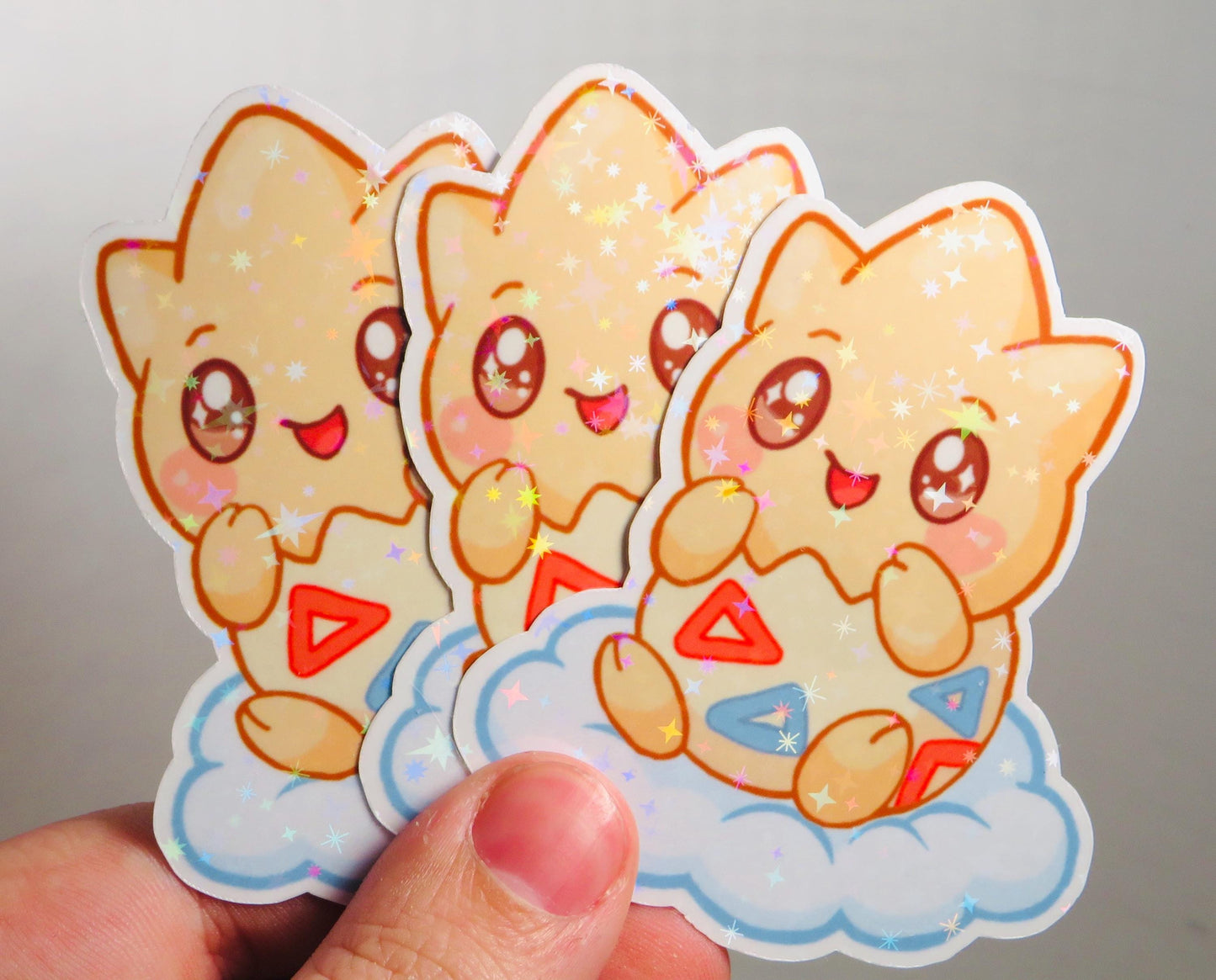 Holographic Cloud Baby Togepi Sticker – Cute Starry Egg Creature Vinyl Decal