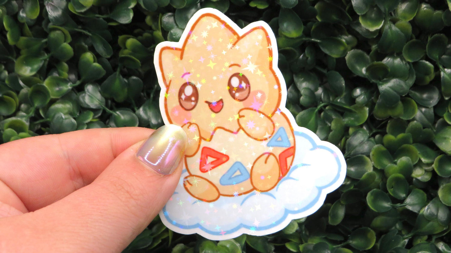 Holographic Cloud Baby Togepi Sticker – Cute Starry Egg Creature Vinyl Decal
